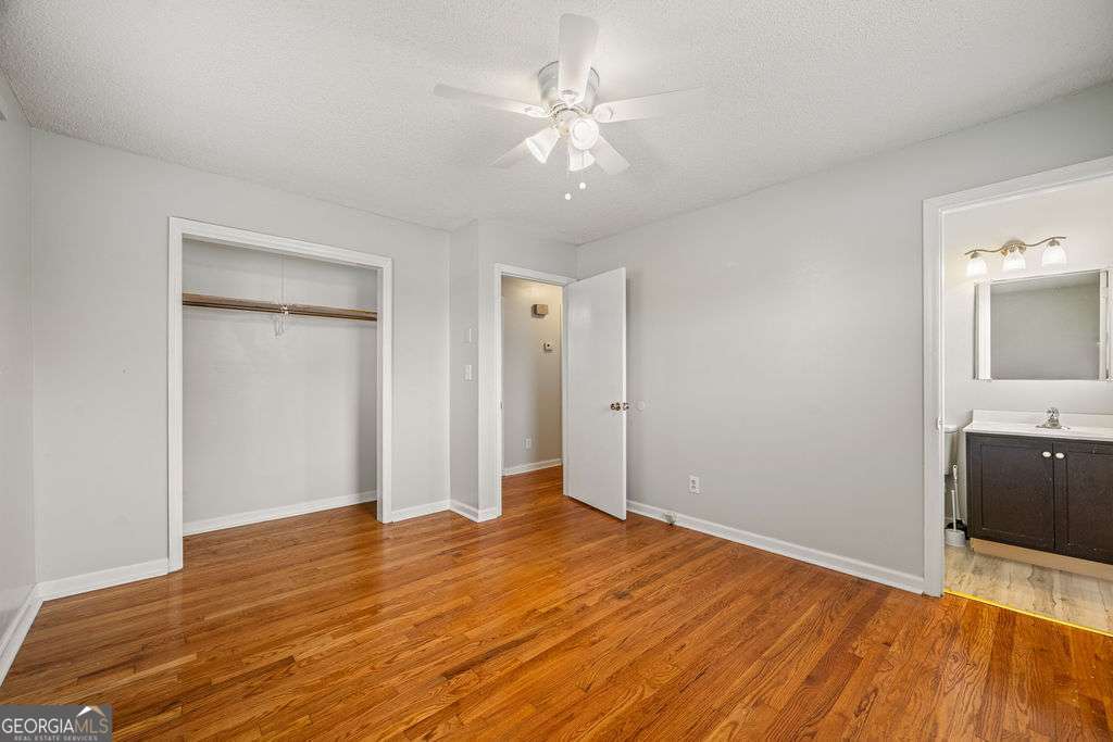 31 Jackson Way Fort Oglethorpe, GA 30742 - Photo 26 of 51 a view of empty room with wooden floor