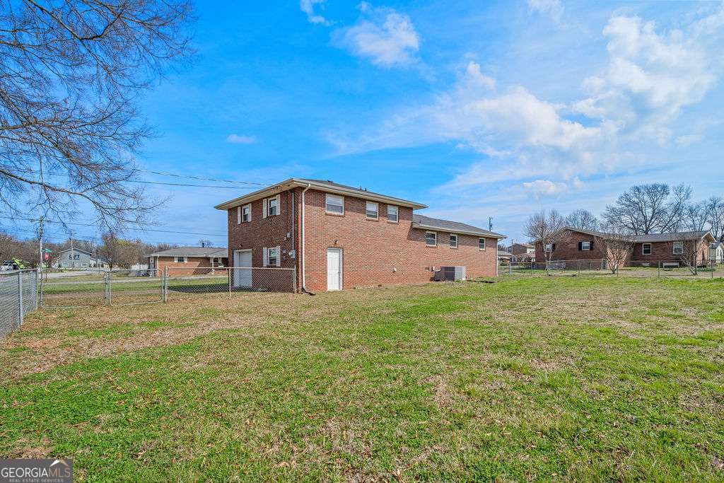 31 Jackson Way Fort Oglethorpe, GA 30742 - Photo 34 of 51 a big yard with large trees