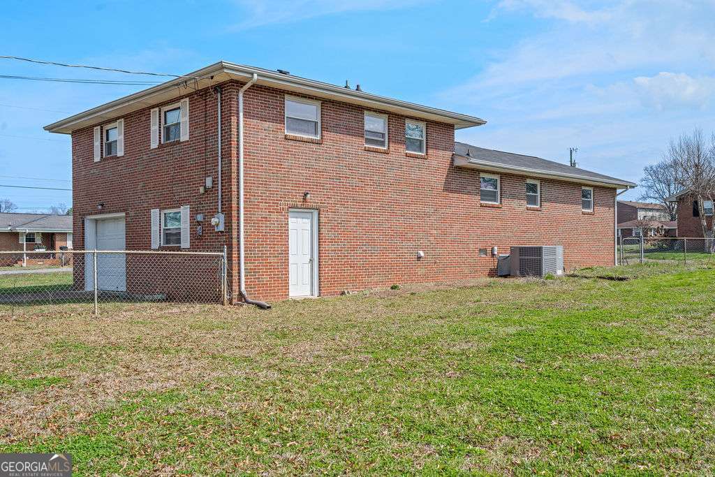 31 Jackson Way Fort Oglethorpe, GA 30742 - Photo 35 of 51 a front view of a house with a yard