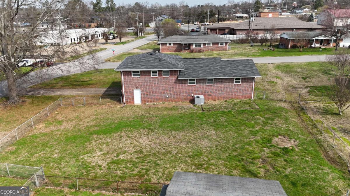 31 Jackson Way Fort Oglethorpe, GA 30742 - Photo 38 of 51 an aerial view of a house with yard swimming pool and lake view