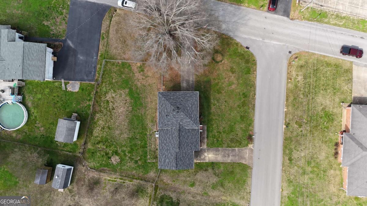 31 Jackson Way Fort Oglethorpe, GA 30742 - Photo 47 of 51 an aerial view of a house with garden space and outdoor seating