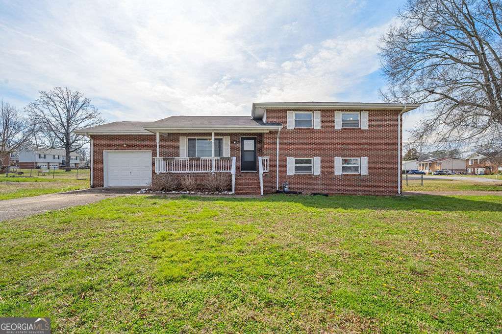 31 Jackson Way Fort Oglethorpe, GA 30742 - Photo 51 of 51 a view of a house with a yard and fountain