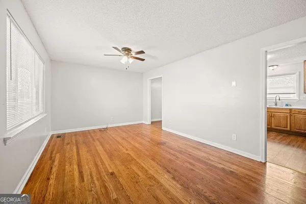 a kitchen with stainless steel appliances a refrigerator and a stove top oven