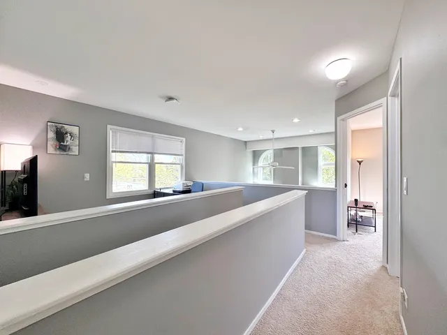 a large living room with a large window