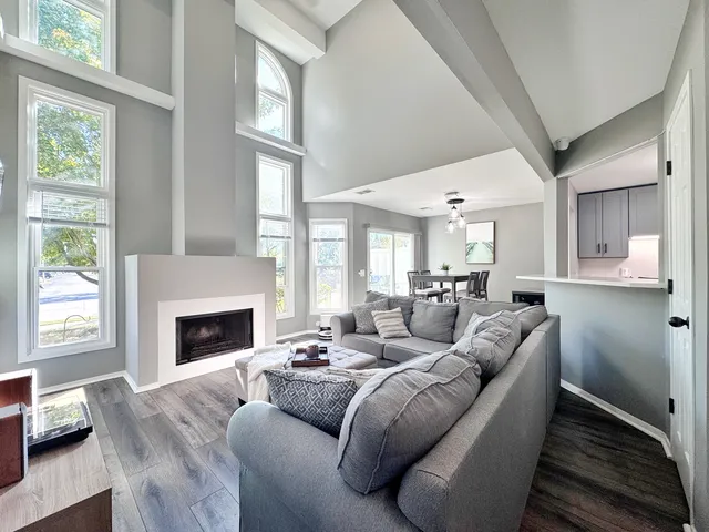 a living room with furniture or fireplace and a window