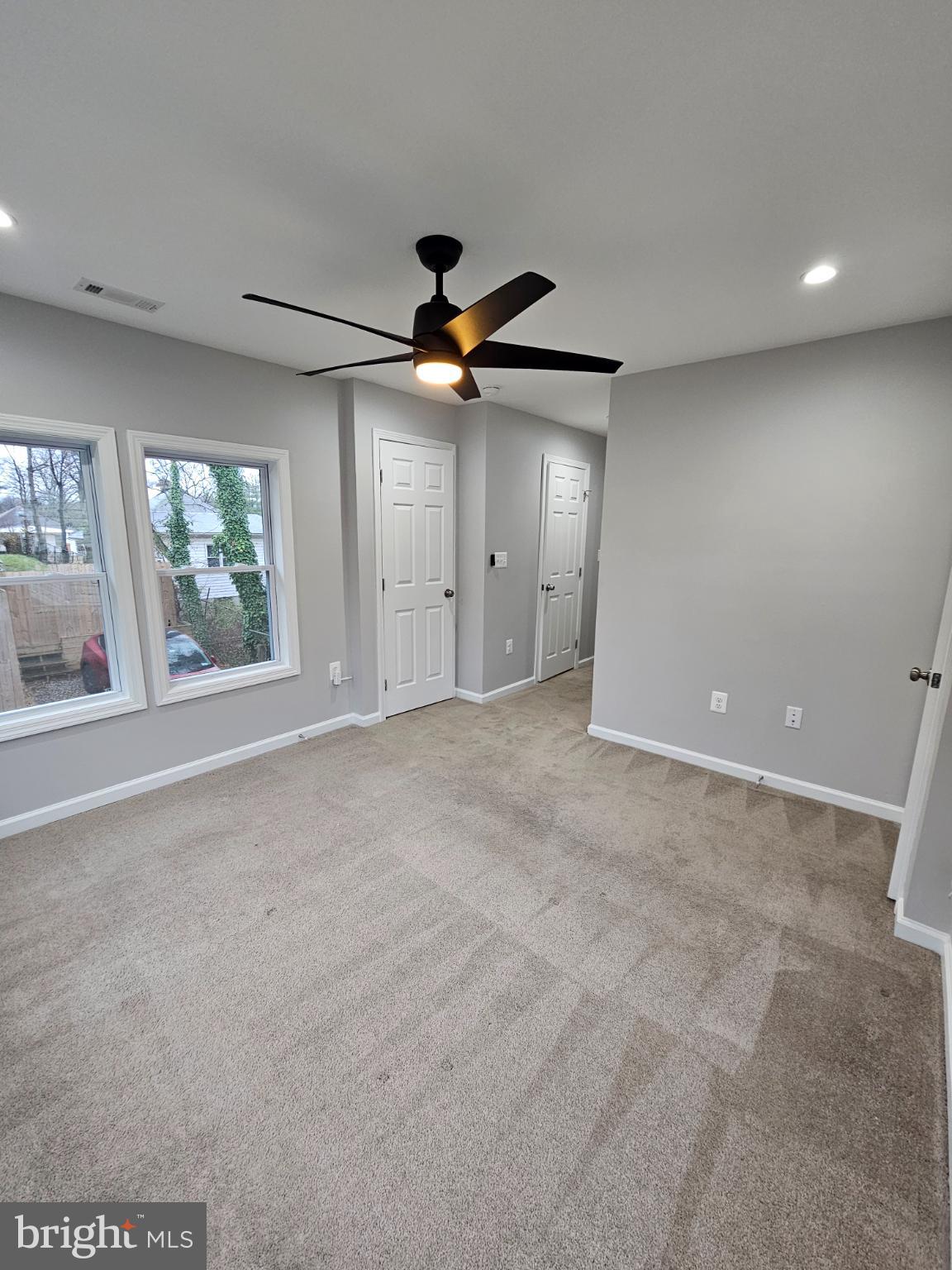 909 45th Place Northeast Washington, DC 20019 - Photo 16 of 36 a view of a livingroom with a ceiling fan and window