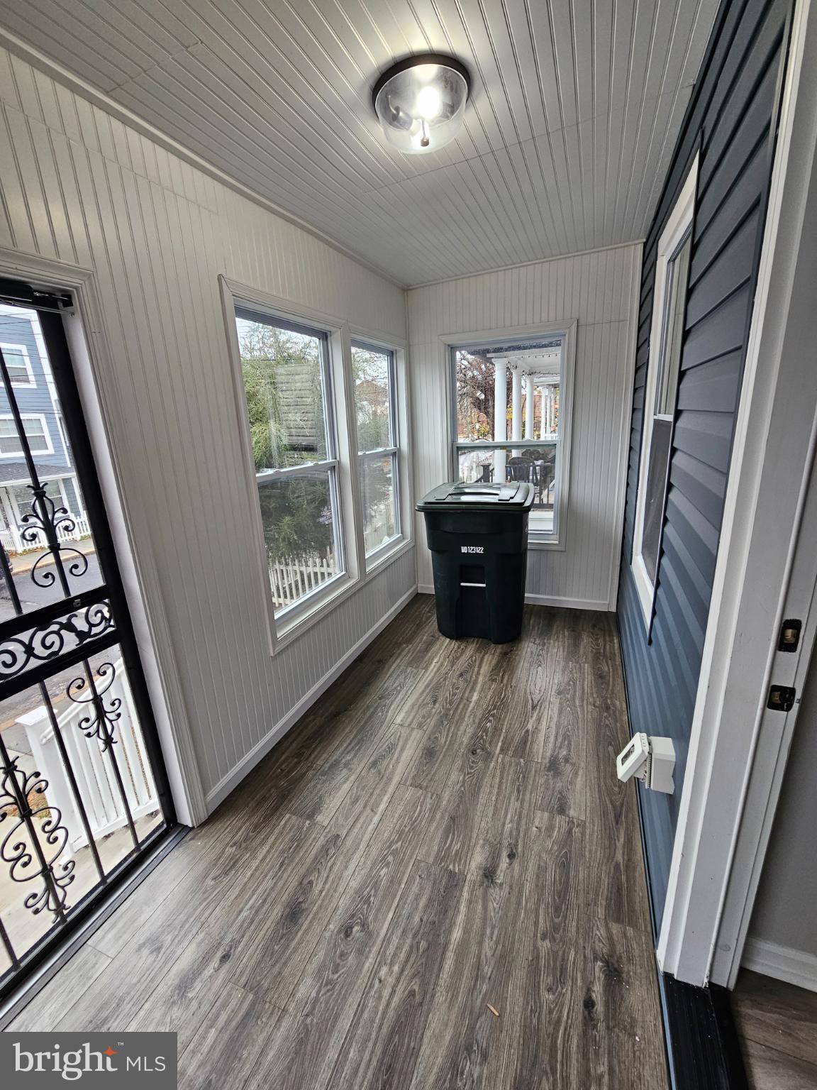 909 45th Place Northeast Washington, DC 20019 - Photo 3 of 36 a view of a livingroom with wooden floor and furniture