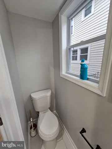 a bathroom with a toilet