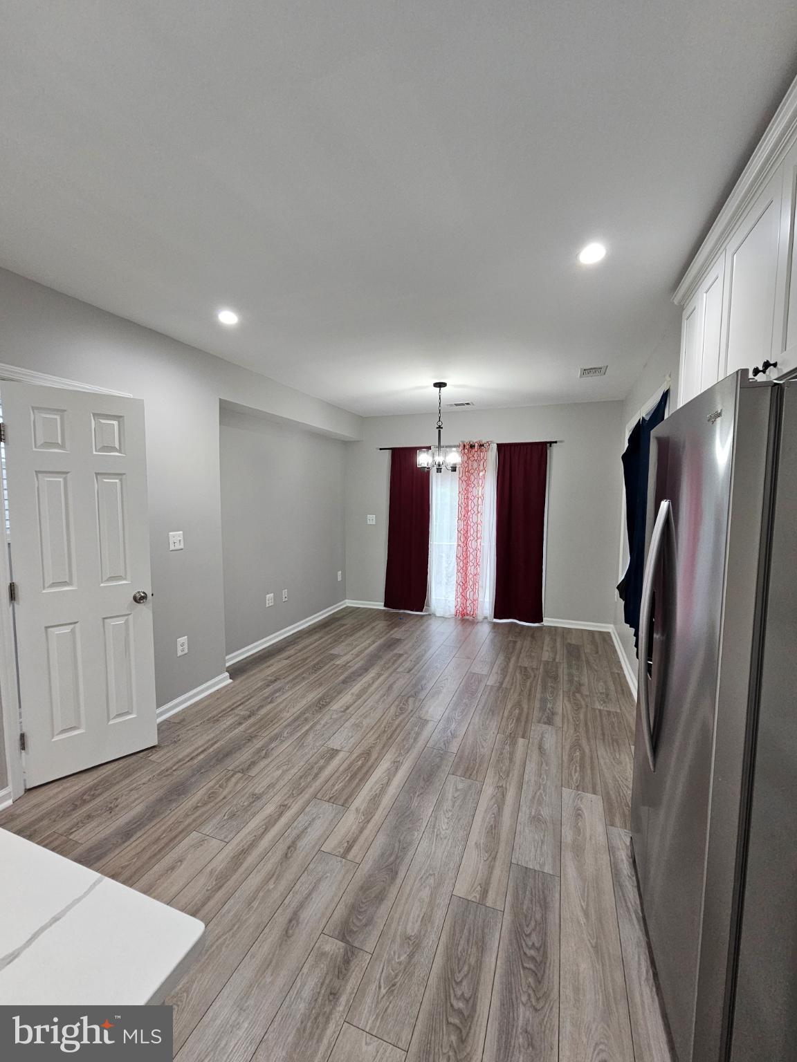 909 45th Place Northeast Washington, DC 20019 - Photo 33 of 36 a view of a livingroom with a refrigerator