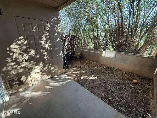 a view of a backyard of the house