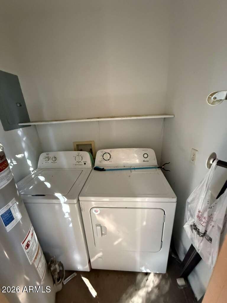 1810 East 8th Street, Unit C Douglas, AZ 85607 - Photo 14 of 14 a utility room with dryer and washer