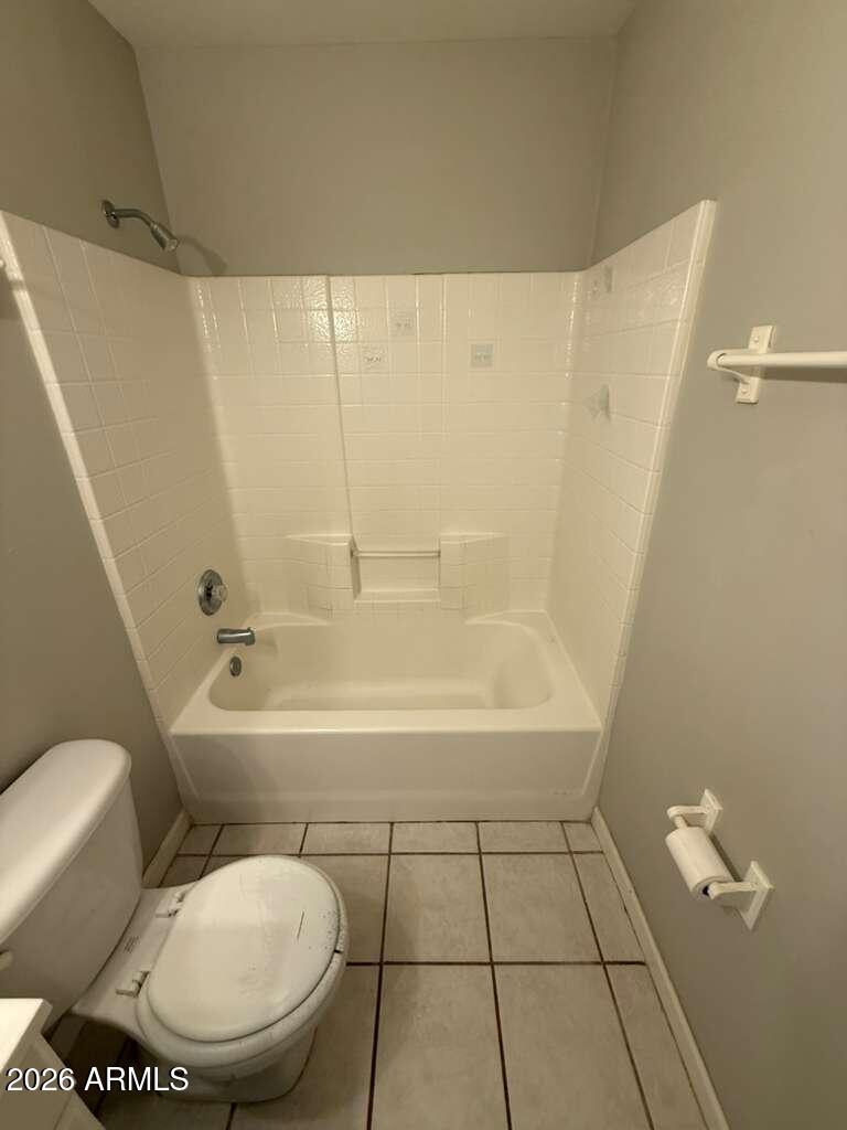 1810 East 8th Street, Unit C Douglas, AZ 85607 - Photo 10 of 14 a bathroom with a toilet and a bathtub