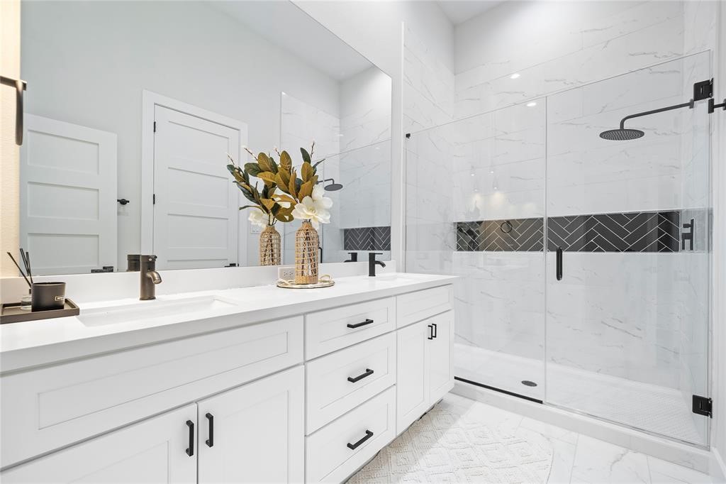 3610 Dreyfus Street, Unit A Houston, TX 77021 - Photo 12 of 20 a bathroom with a double vanity sink and mirror