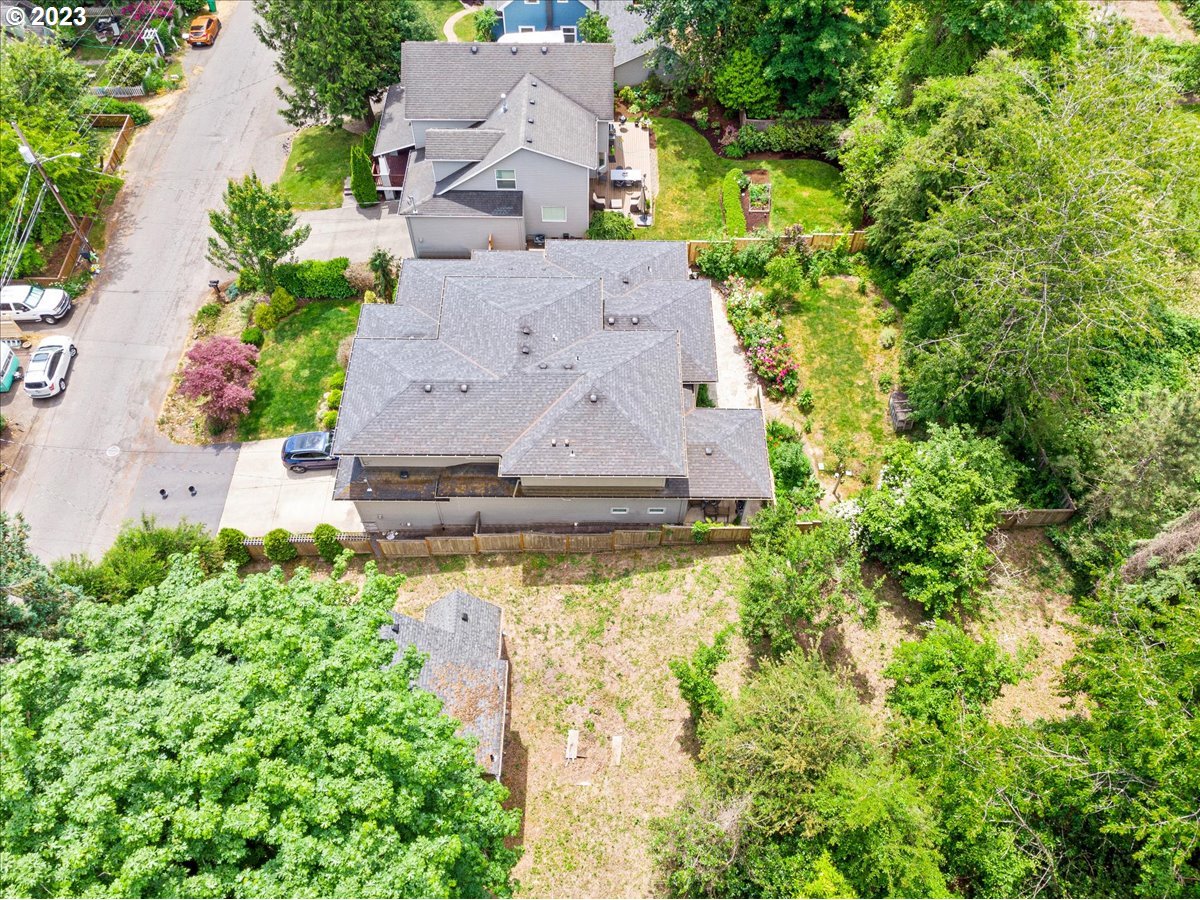 9429 Southwest View Point Terrace Portland, OR 97219 - Photo 8 of 12 an aerial view of a house with a yard lake outdoor and lake view