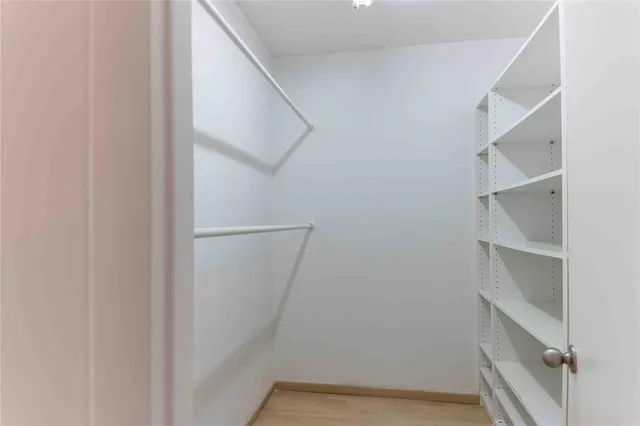 a bathroom with a shower and a toilet