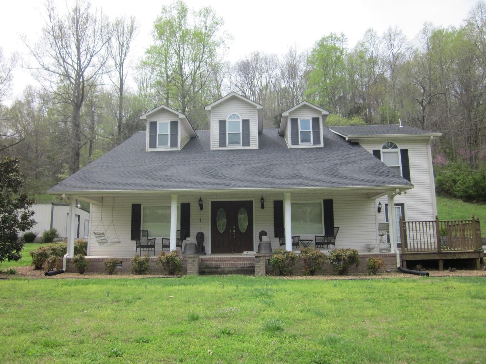 500 Normandy Tullahoma Road Normandy, TN 37360 - Photo 1 of 26 a front view of a house with a garden