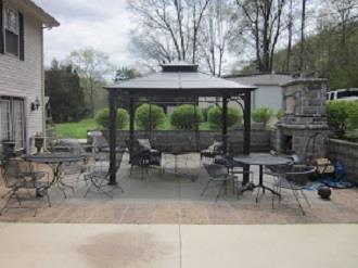 500 Normandy Tullahoma Road Normandy, TN 37360 - Photo 25 of 26 a view of a patio with a table and chairs and couches