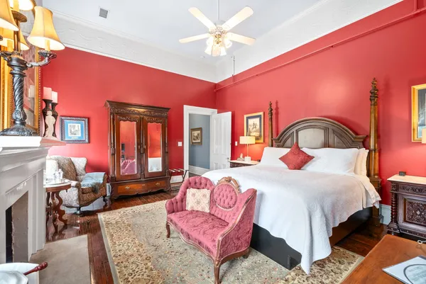 a view of a patio with dining table and chairs