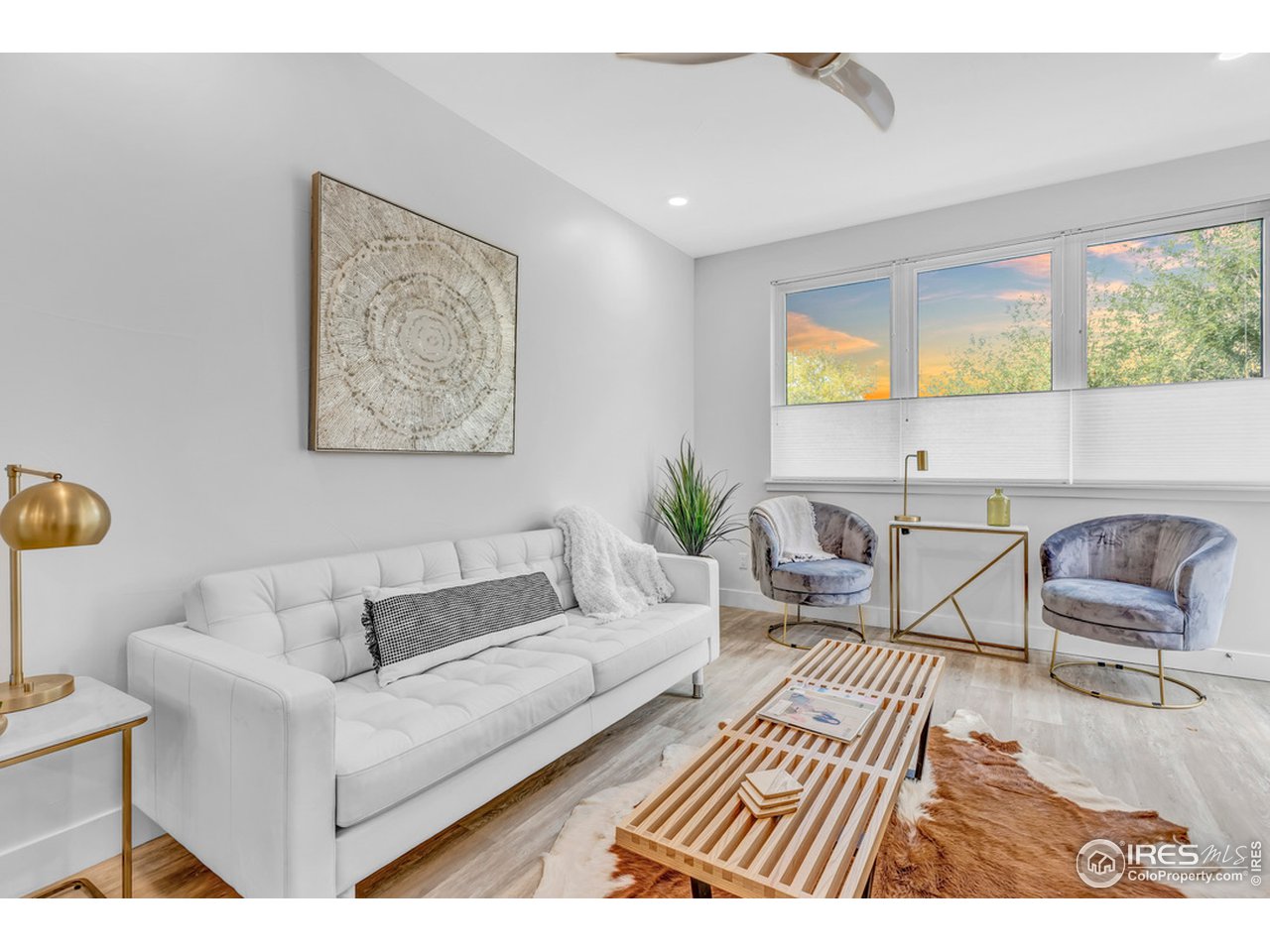 3261 Airport Road, Unit 204 Boulder, CO 80301 - Photo 11 of 36 a living room with furniture and a large window