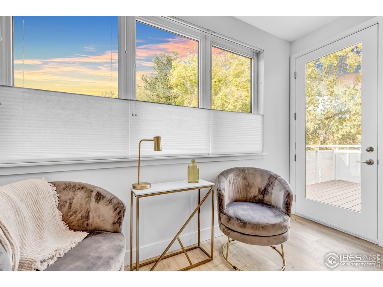 3261 Airport Road, Unit 204 Boulder, CO 80301 - Photo 12 of 36 a living room with a couch and a window