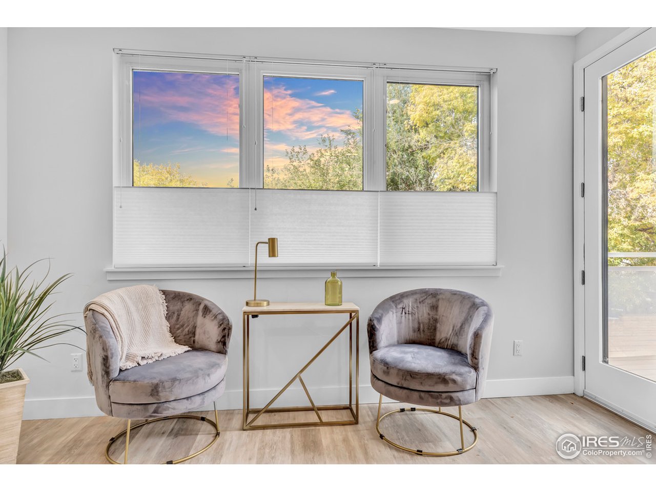 3261 Airport Road, Unit 204 Boulder, CO 80301 - Photo 13 of 36 a living room with furniture and a window