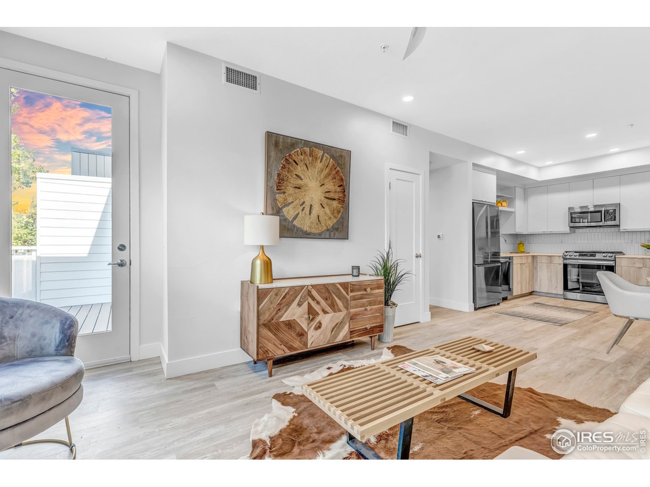 3261 Airport Road, Unit 204 Boulder, CO 80301 - Photo 2 of 36 a living room with furniture and a rug