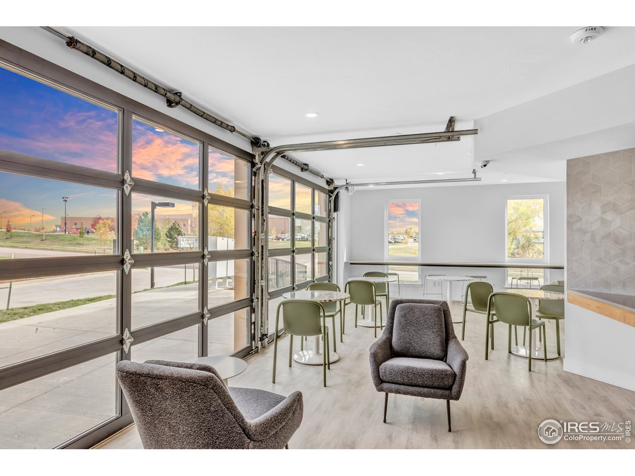 3261 Airport Road, Unit 204 Boulder, CO 80301 - Photo 23 of 36 a living room with furniture a fireplace and a table