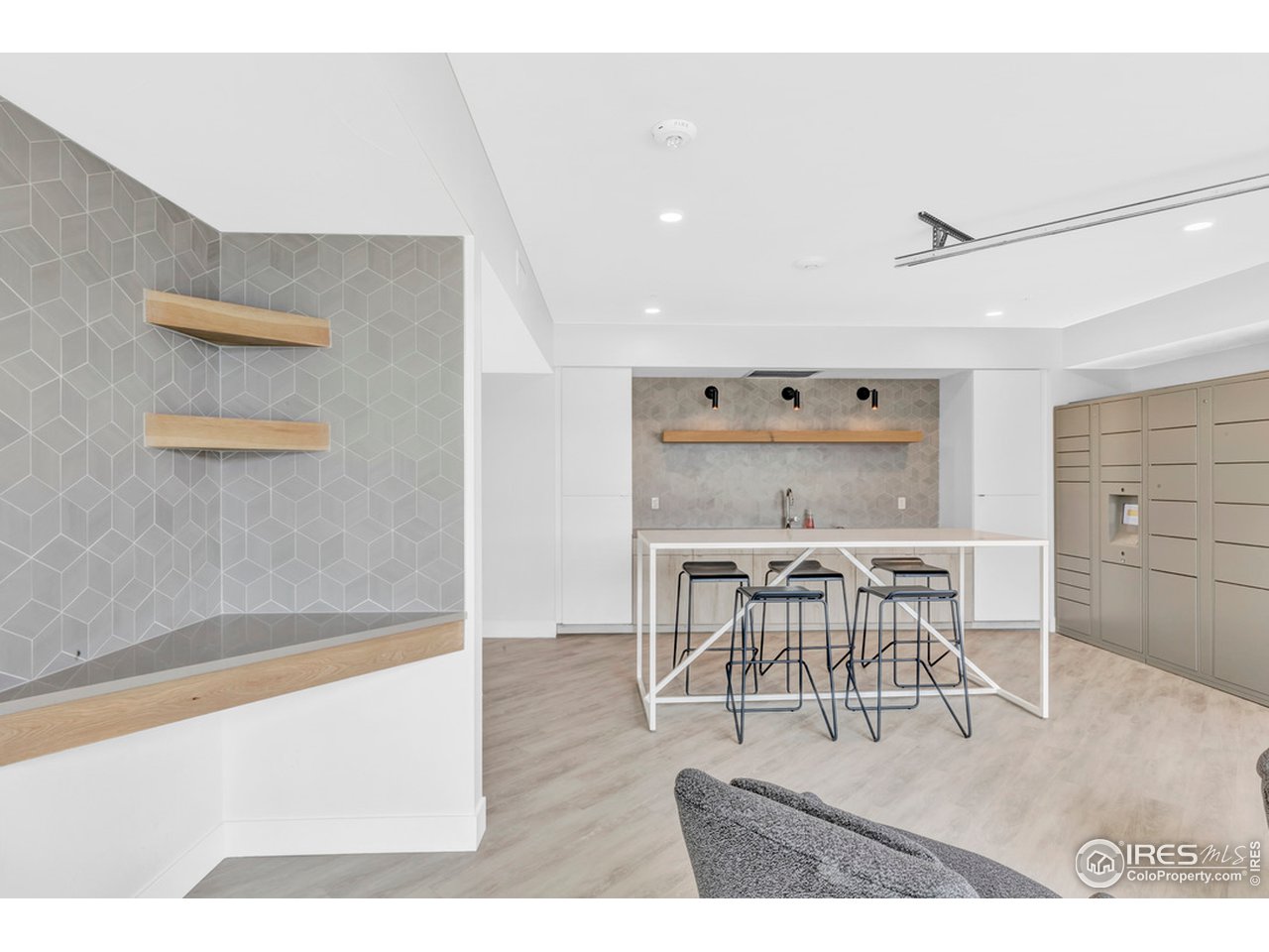 3261 Airport Road, Unit 204 Boulder, CO 80301 - Photo 25 of 36 a view of a dining room with furniture and wooden floor