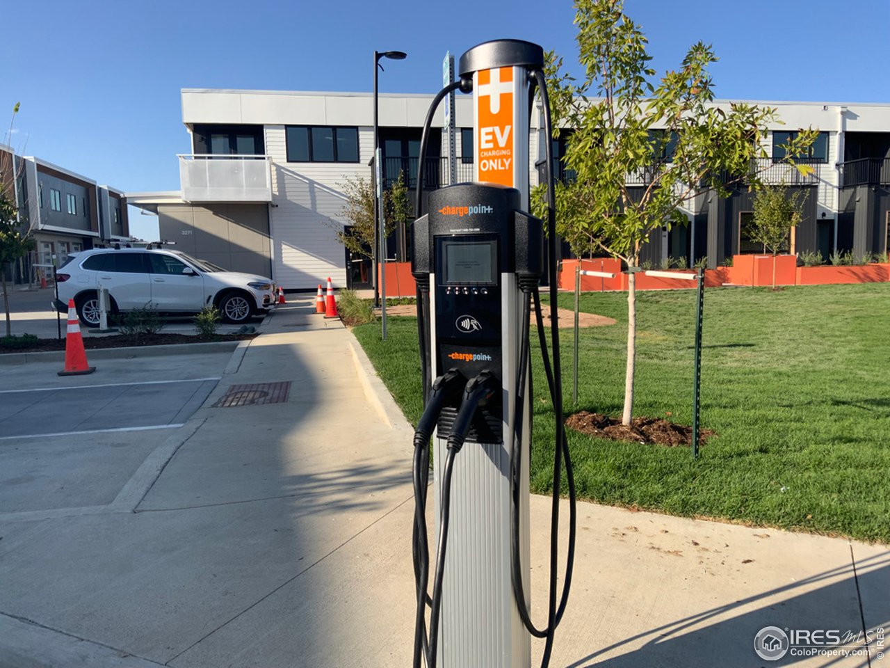 3261 Airport Road, Unit 204 Boulder, CO 80301 - Photo 34 of 36 a view of a street with cars parked in front of a house