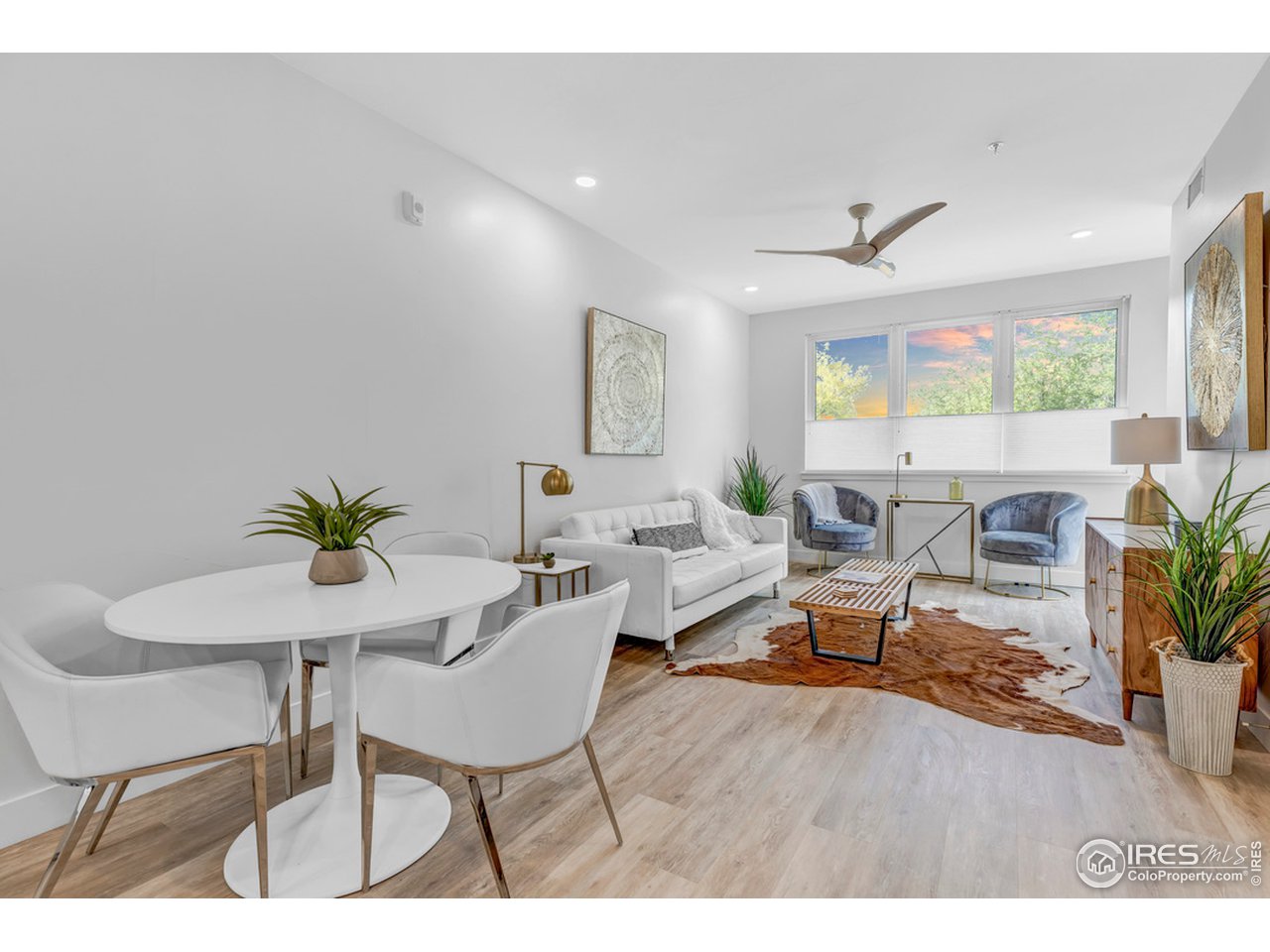 3261 Airport Road, Unit 204 Boulder, CO 80301 - Photo 4 of 36 a living room with furniture potted plant and a window