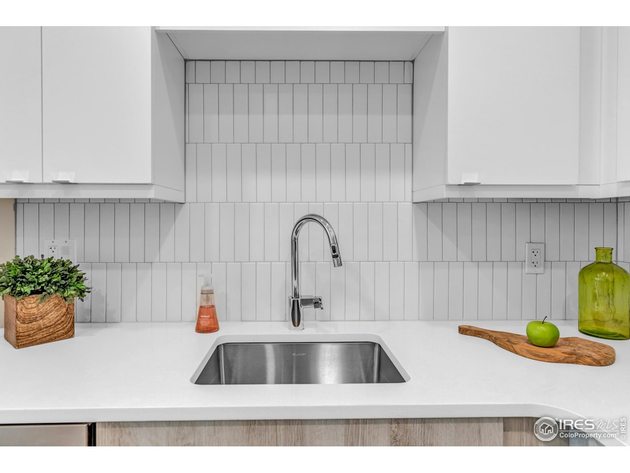 3261 Airport Road, Unit 204 Boulder, CO 80301 - Photo 6 of 36 a kitchen with a sink and a window