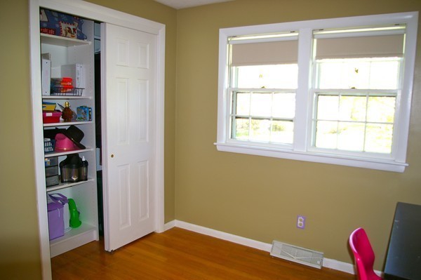 59 Joyce Road Framingham, MA 01701 - Photo 21 of 30 a view of a room with shelves and a window