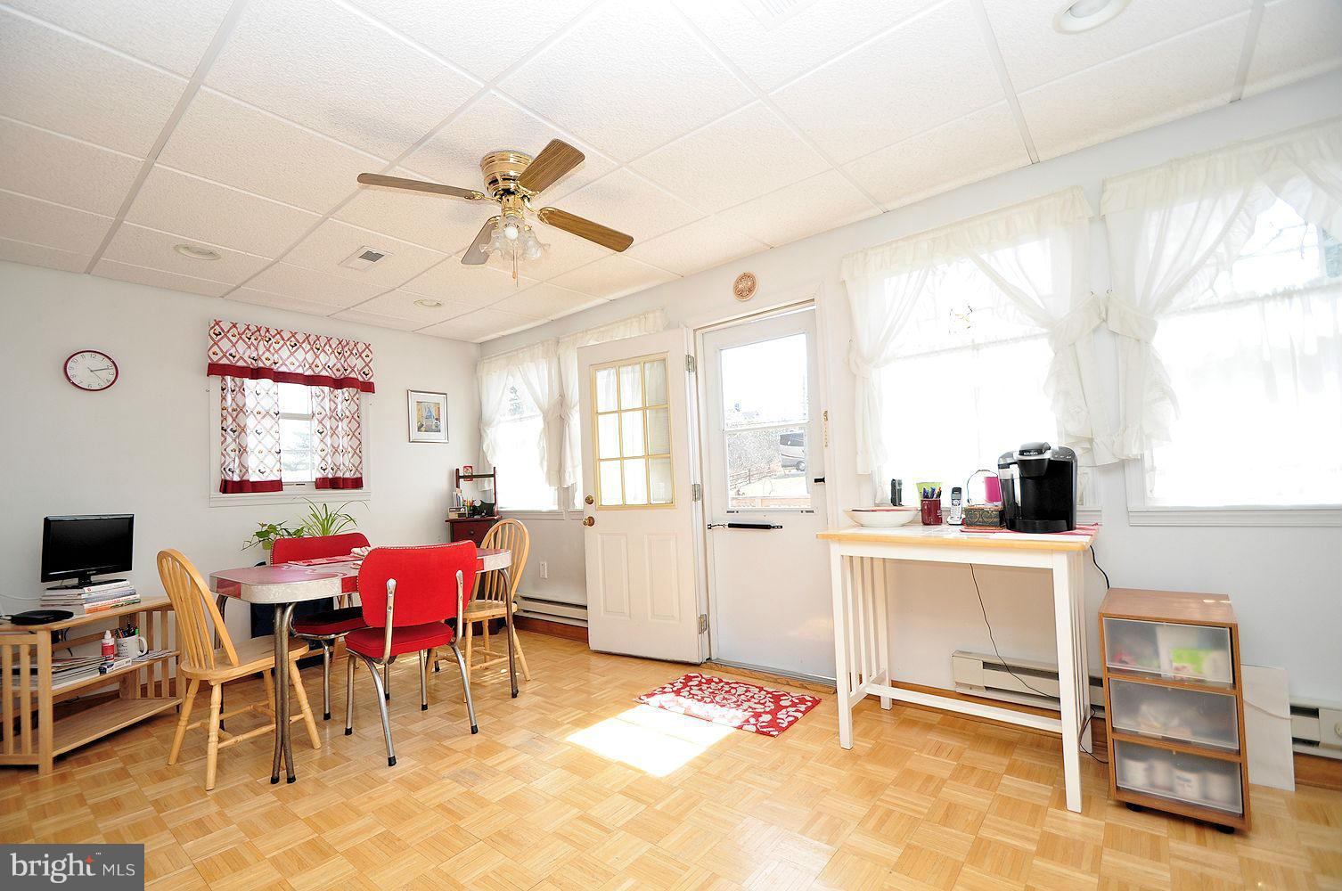 642 Coleraine Road Baltimore, MD 21229 - Photo 13 of 26 a view of a dining room with furniture