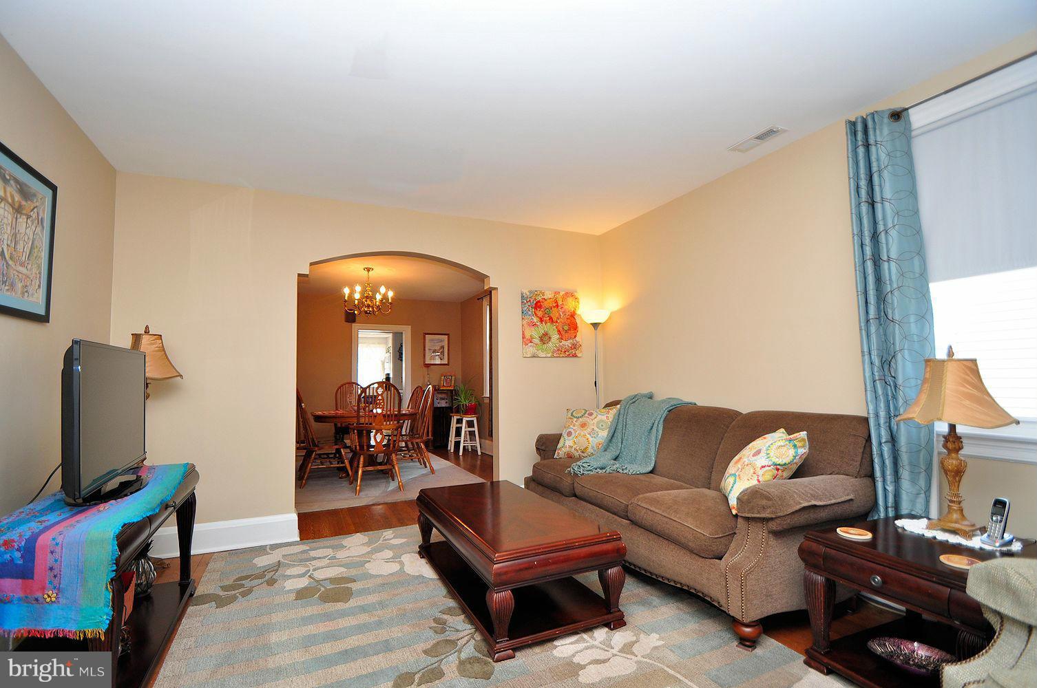 642 Coleraine Road Baltimore, MD 21229 - Photo 10 of 26 a living room with furniture and a flat screen tv