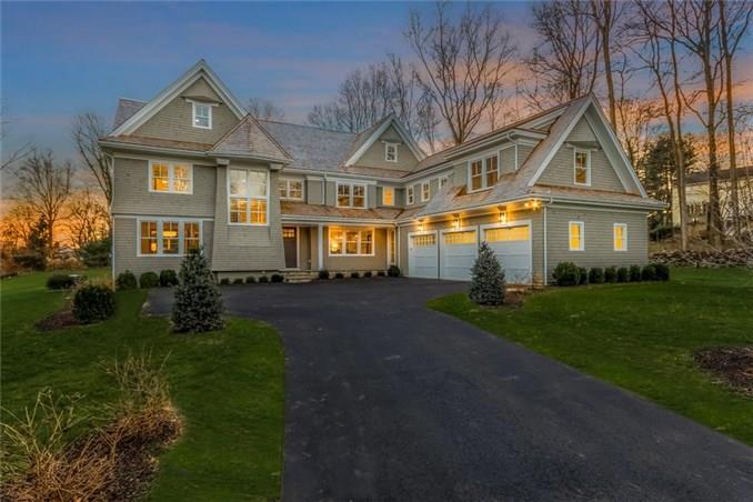 37 High Point Road Westport, CT 06880 - Photo 1 of 1 a front view of a house with a garden and trees