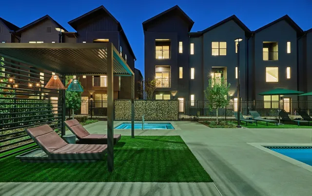 a view of a swimming pool with a lounge chairs
