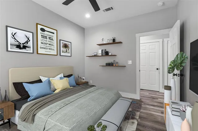 a bedroom with a bed and a view of bathroom