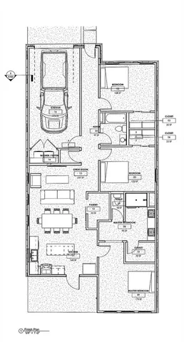 a black and white photo of a living room