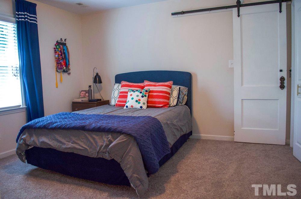 8709 Sleepy Creek Drive Raleigh, NC 27613 - Photo 16 of 28 Bedroom 2