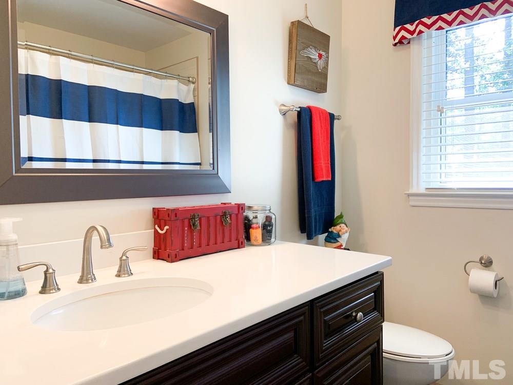 8709 Sleepy Creek Drive Raleigh, NC 27613 - Photo 18 of 28 Secondary Bath