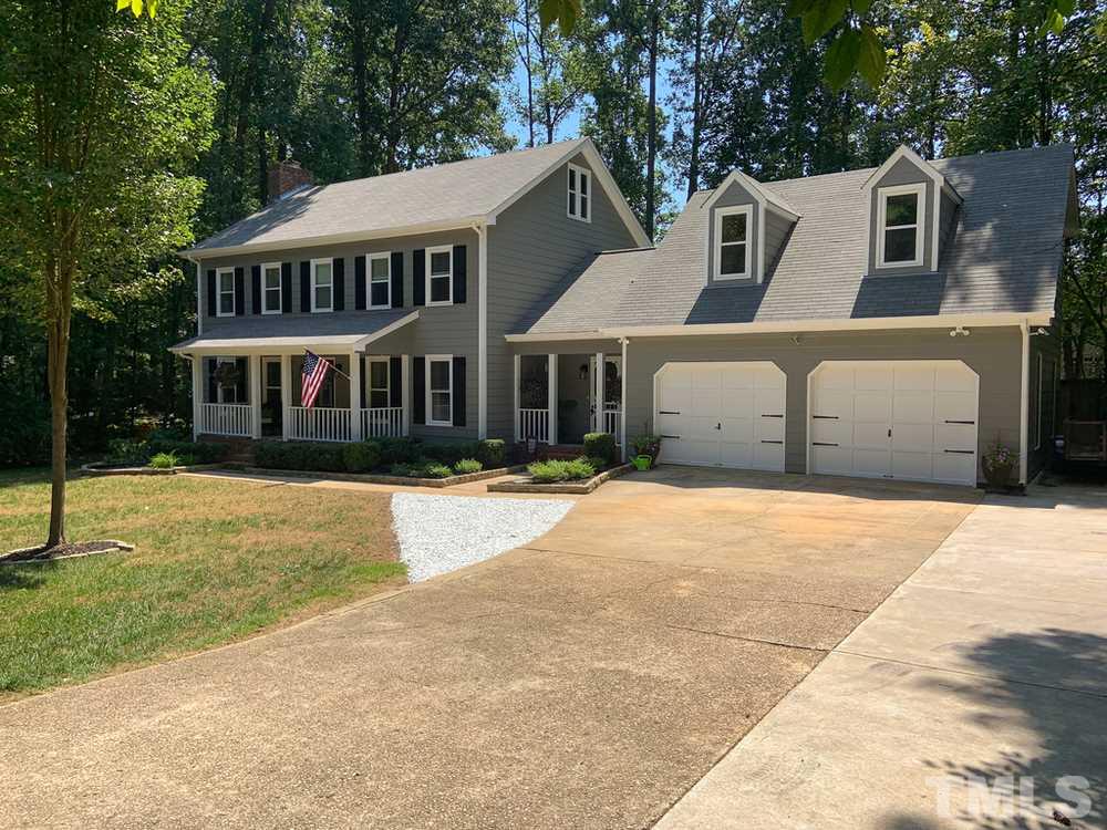 8709 Sleepy Creek Drive Raleigh, NC 27613 - Photo 3 of 28 Front Angle Left - Lots of Parking - Outside of the oversized 2 Car Garage.