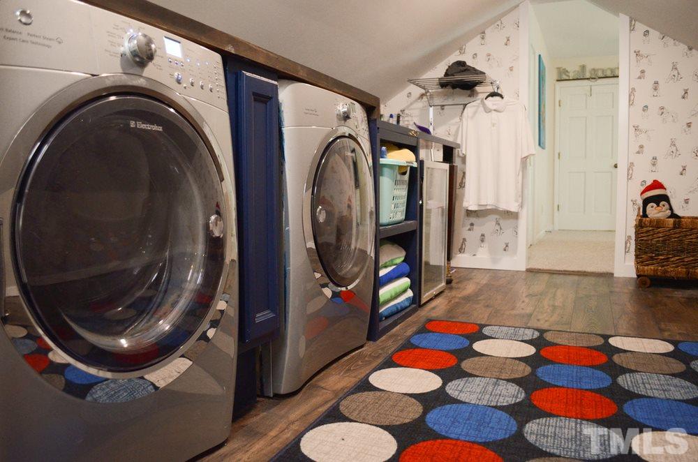 8709 Sleepy Creek Drive Raleigh, NC 27613 - Photo 23 of 28 Laundry Room Hall