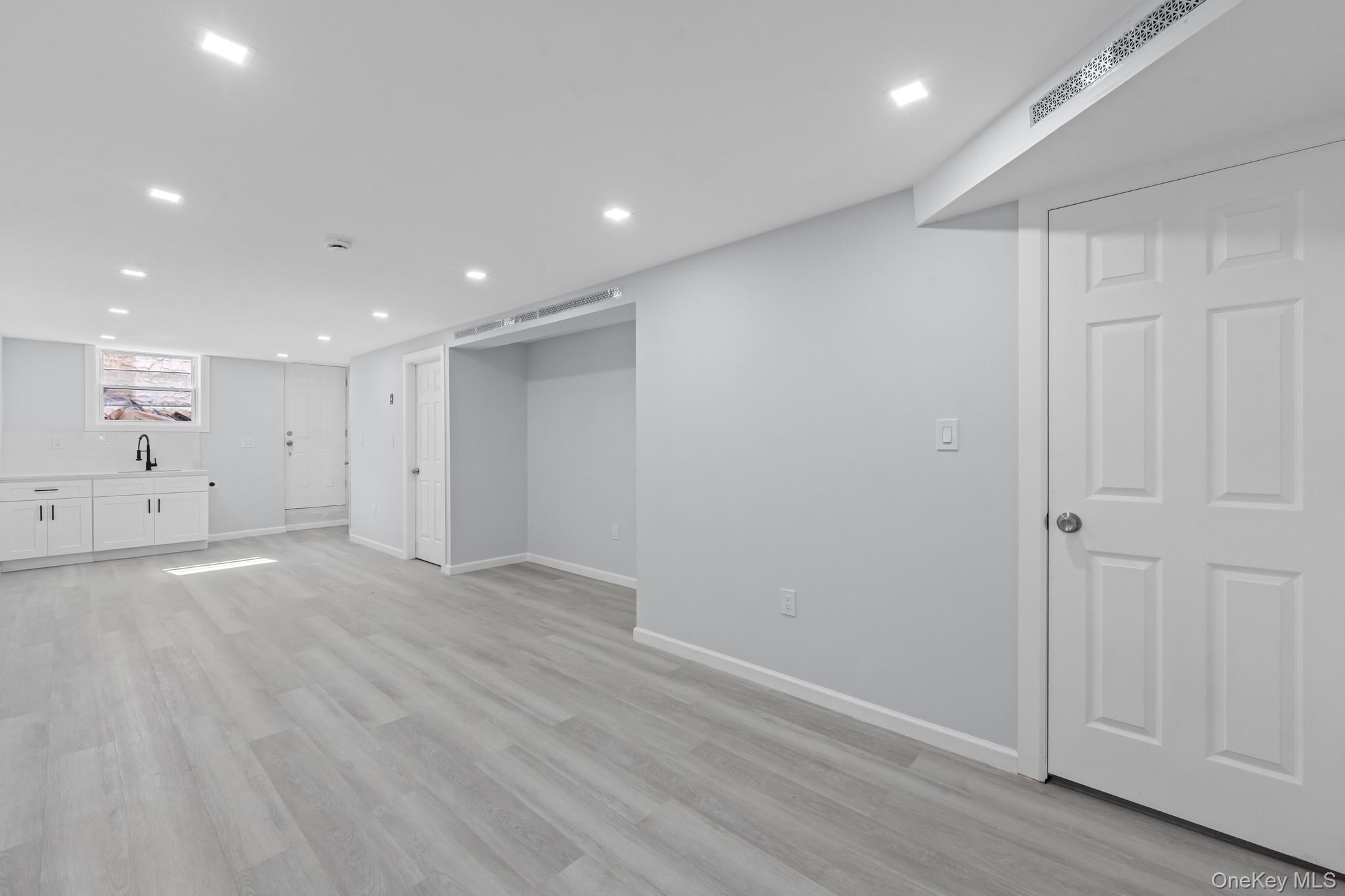 110-08 172nd Street Queens, NY 11433 - Photo 10 of 15 a view of an empty room