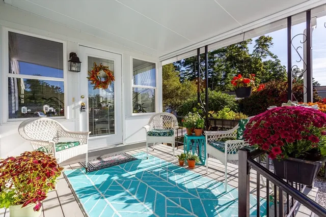a outdoor living space with patio furniture and potted plants