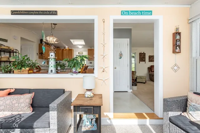 a living room with furniture and a table