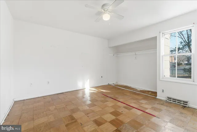 an empty room with windows