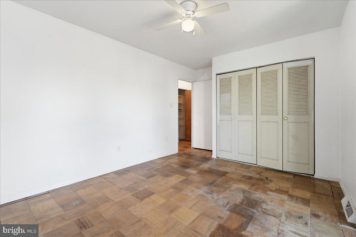 330 Shenandoah Street Southeast Leesburg, VA 20175 - Photo 14 of 17 a view of an empty room with a fan