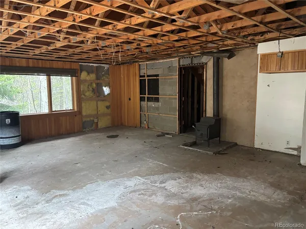 a view of empty room with windows