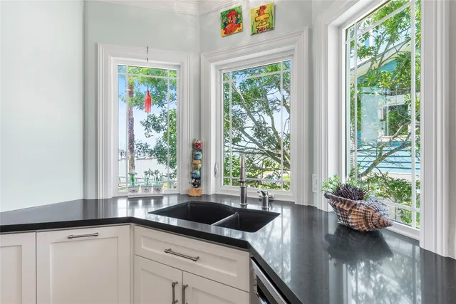 a view of a kitchen and living room