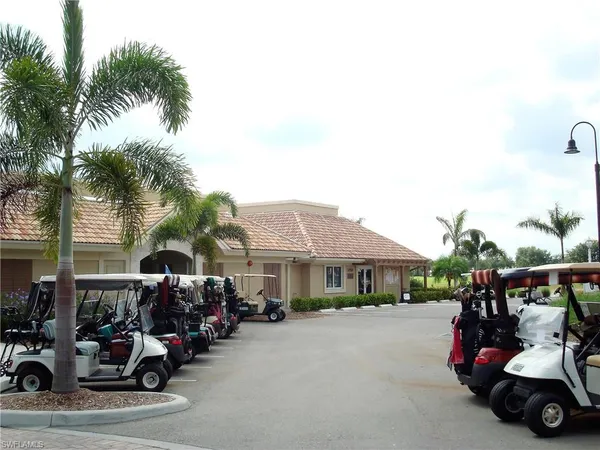 a view of a car parked in front of a house